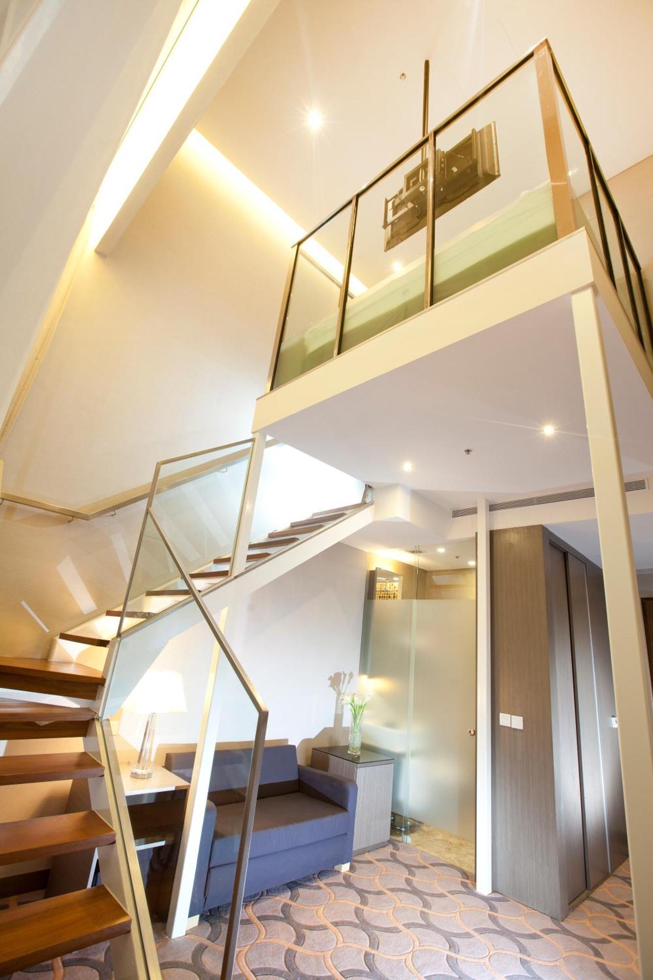 Habitación tipo loft con cama extragrande